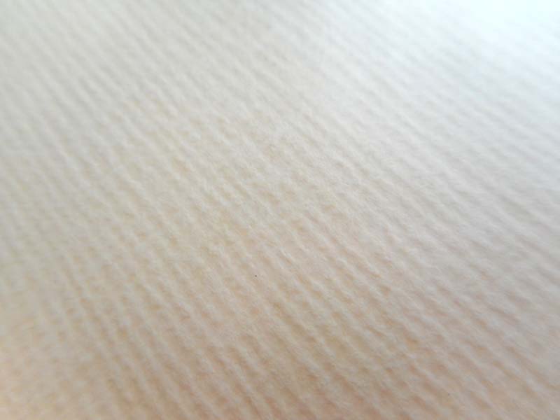 肌色の紙の画像がここに入っています